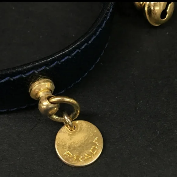 Black■DetailsA pre-owned .PRADA Saffiano Leather Bell Motif Bangle Bracelet/8 - Picture 8 of 8